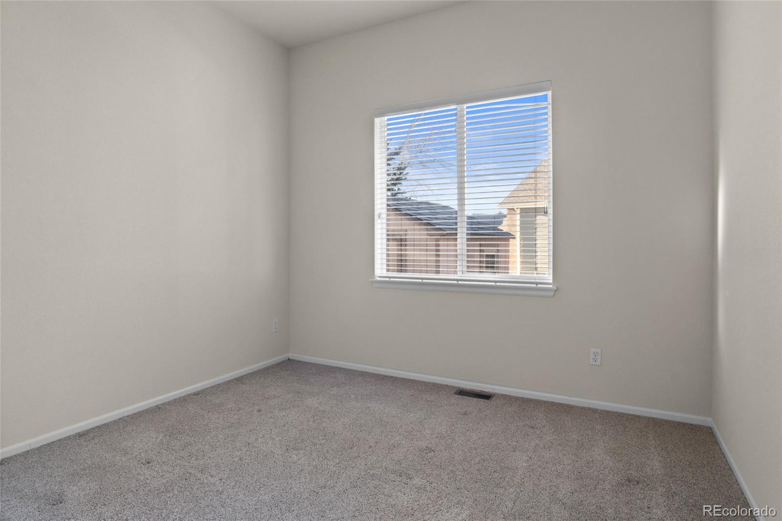 20800 Omaha Avenue Parker, CO 80138 - Photo 20 of 38 an empty room with a window