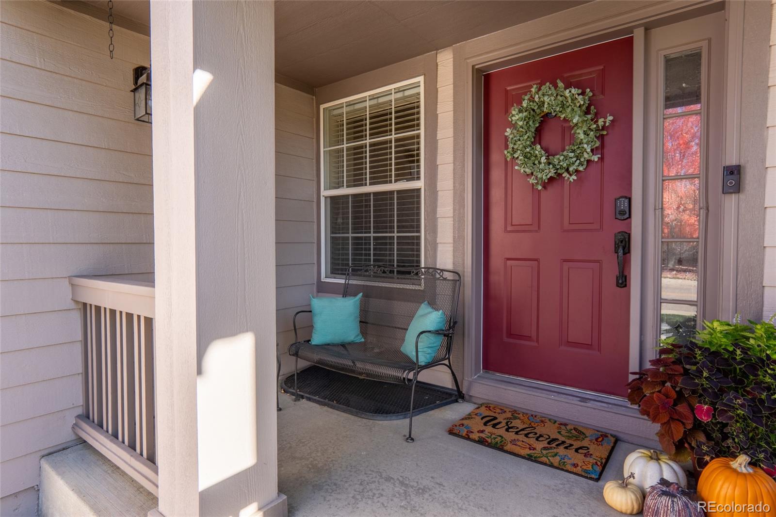 20800 Omaha Avenue Parker, CO 80138 - Photo 2 of 38 a view of front door with outdoor seating