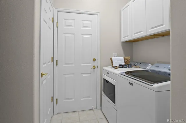 a kitchen with a stove and a refrigerator