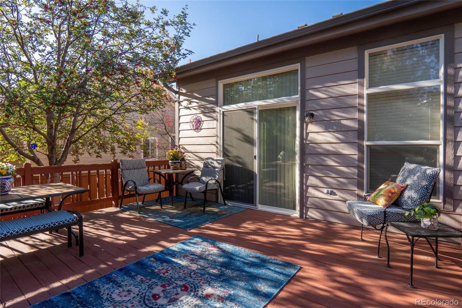 20800 Omaha Avenue Parker, CO 80138 - Photo 28 of 38 a backyard of a house with barbeque oven table and chairs