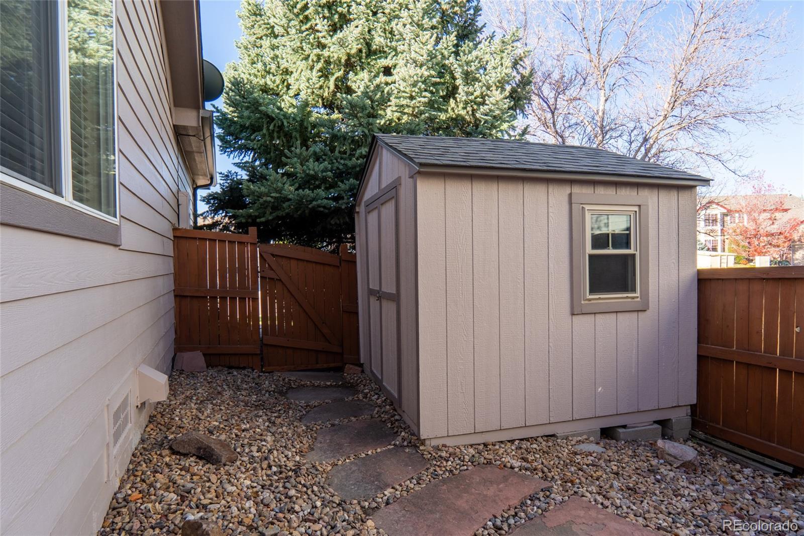 20800 Omaha Avenue Parker, CO 80138 - Photo 30 of 38 a view of a house with a yard