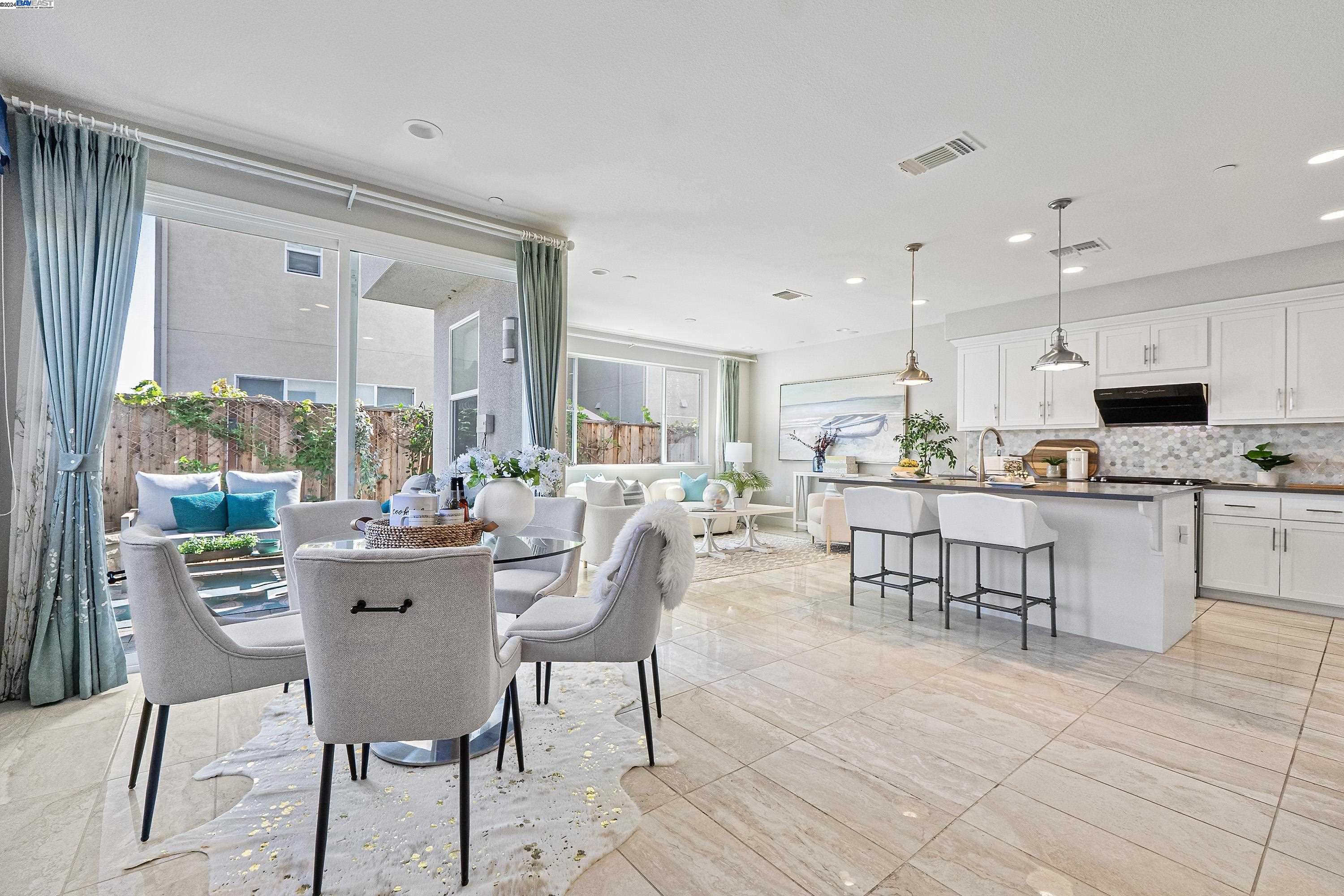 38064 Salty Cove Road Newark, CA 94560 - Photo 1 of 1 a view of a dining room kitchen and a window