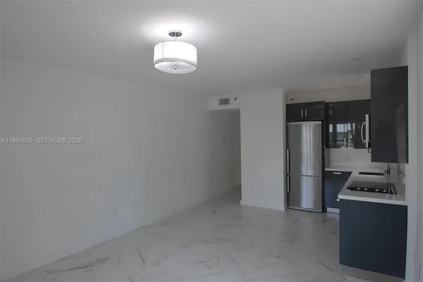 a bathroom with a toilet a sink and a shower