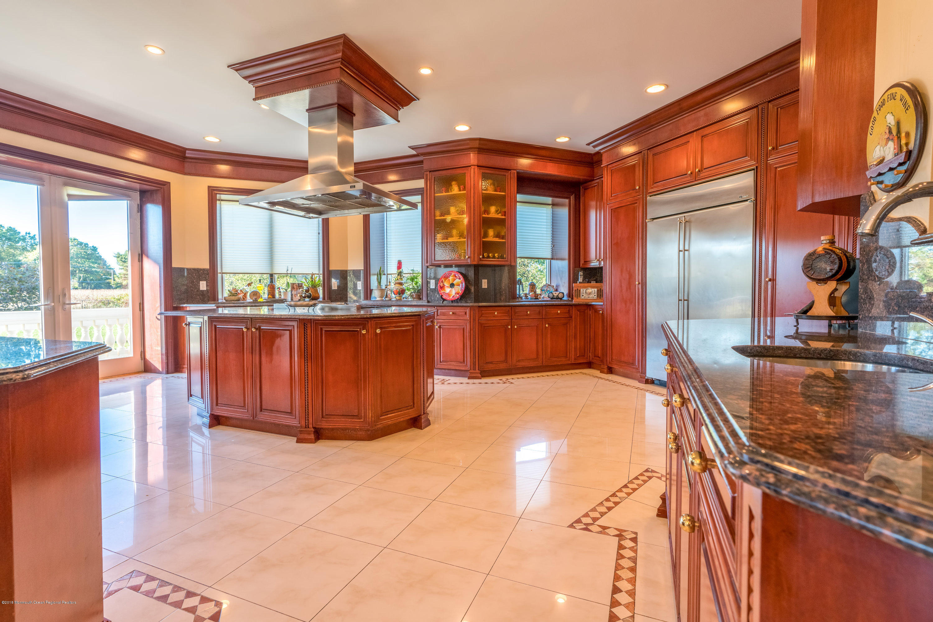 93 Five Points Road Freehold, NJ 07728 - Photo 11 of 48 a kitchen with stainless steel appliances granite countertop a stove and a refrigerator