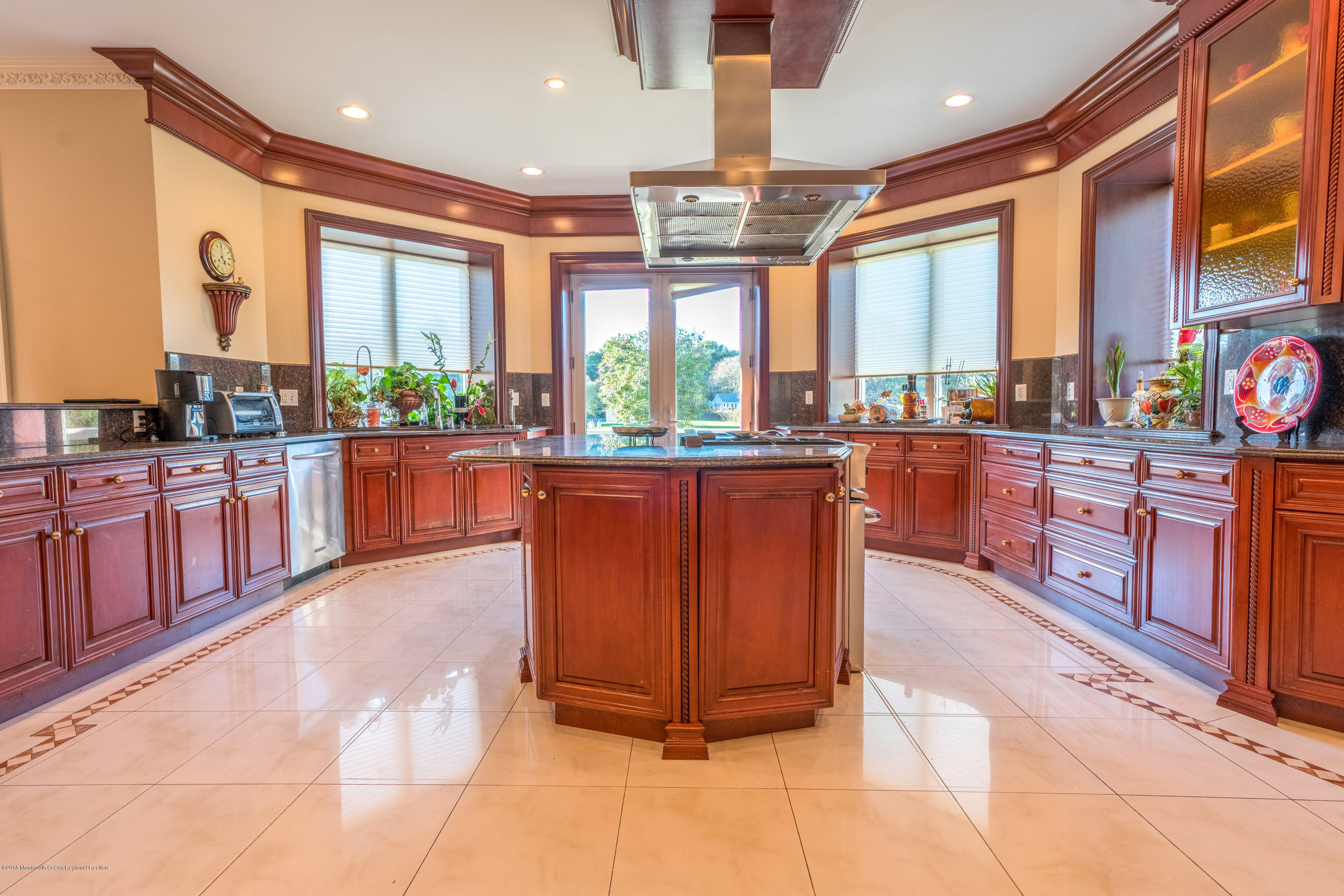 93 Five Points Road Freehold, NJ 07728 - Photo 13 of 48 a large kitchen with kitchen island granite countertop a large counter top stainless steel appliances a large window and cabinets