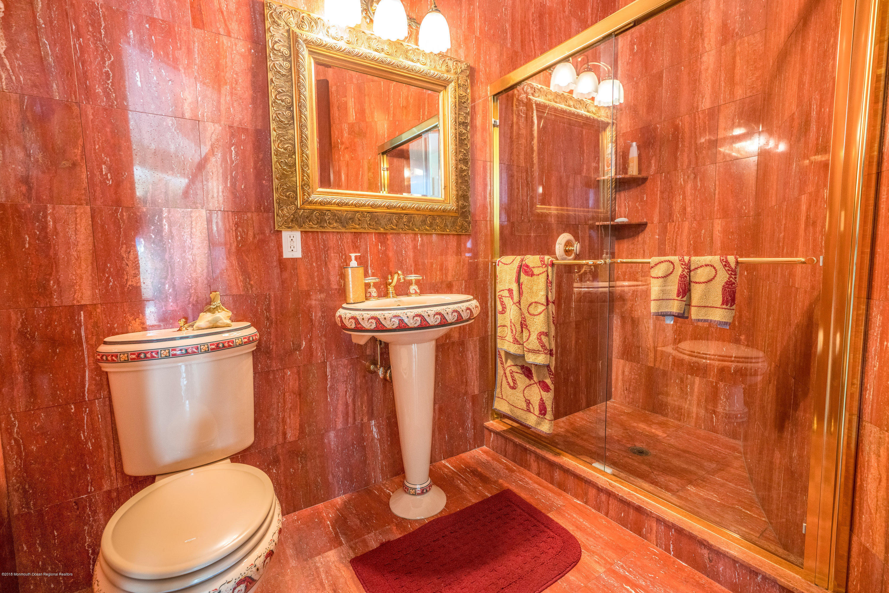 93 Five Points Road Freehold, NJ 07728 - Photo 14 of 48 a white toilet sitting next to a bathroom sink