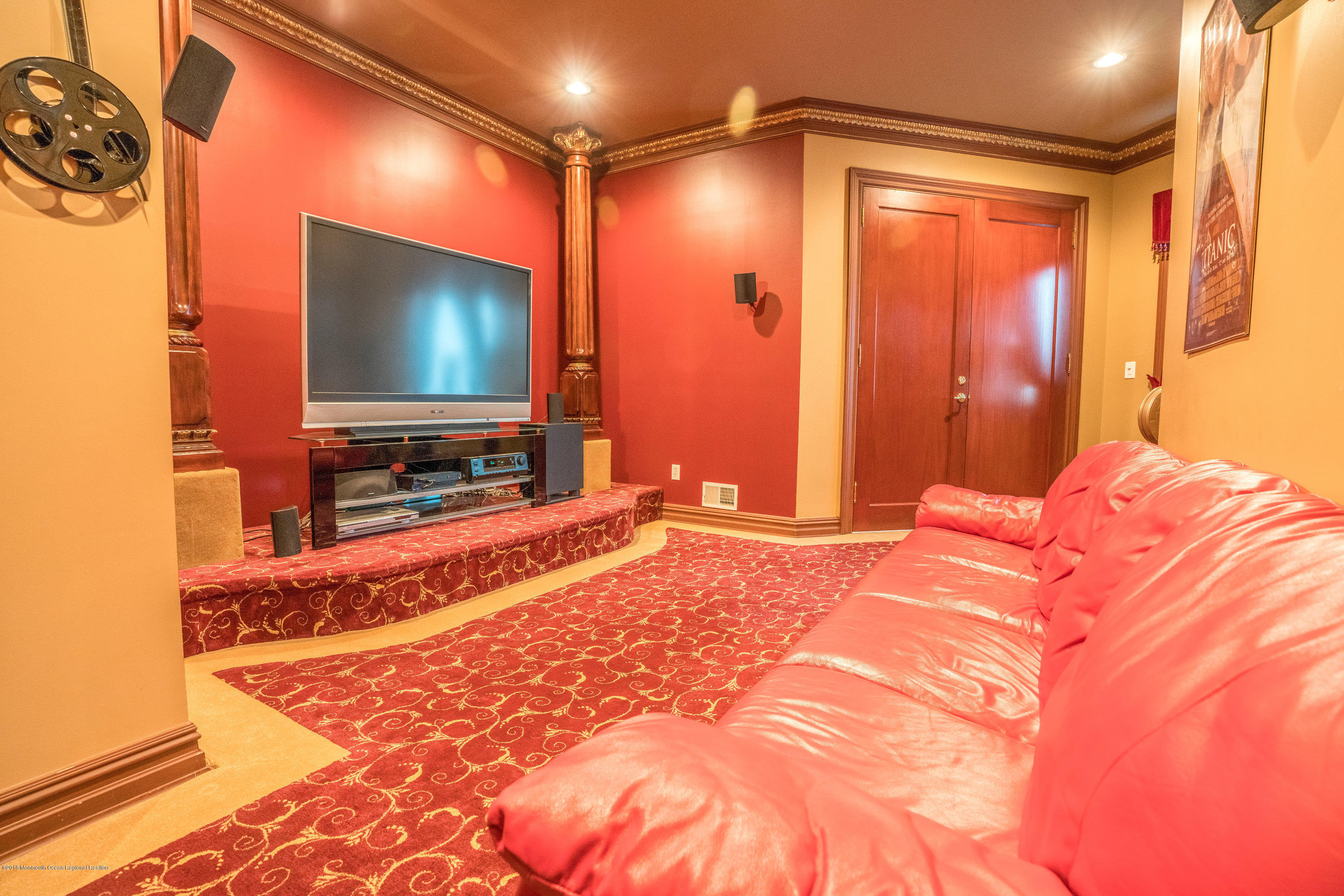 93 Five Points Road Freehold, NJ 07728 - Photo 17 of 48 a bedroom with a bed and a flat screen tv