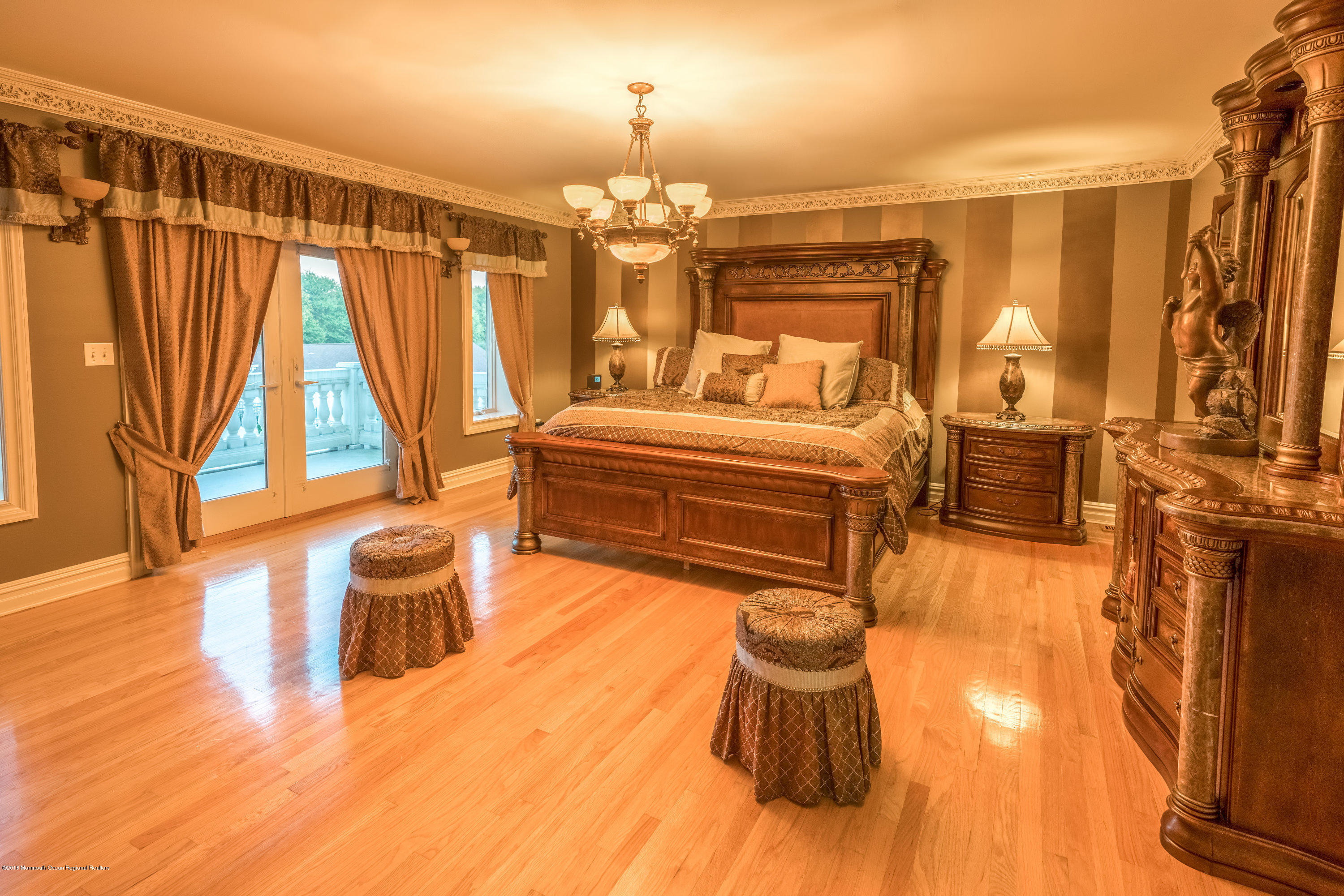 93 Five Points Road Freehold, NJ 07728 - Photo 28 of 48 a bedroom with a bed and wooden floor