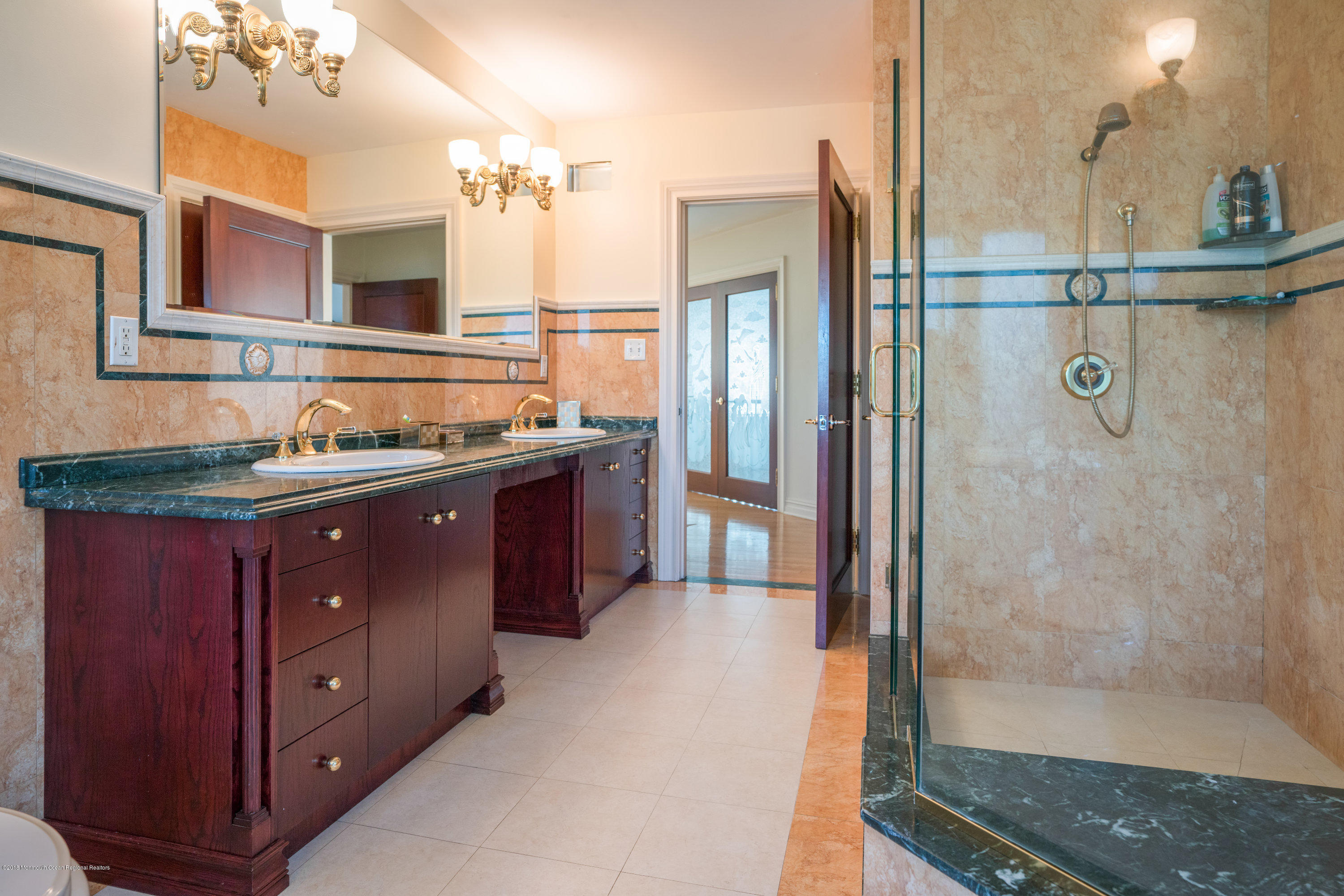 93 Five Points Road Freehold, NJ 07728 - Photo 30 of 48 a bathroom with a granite countertop sink mirror and a shower