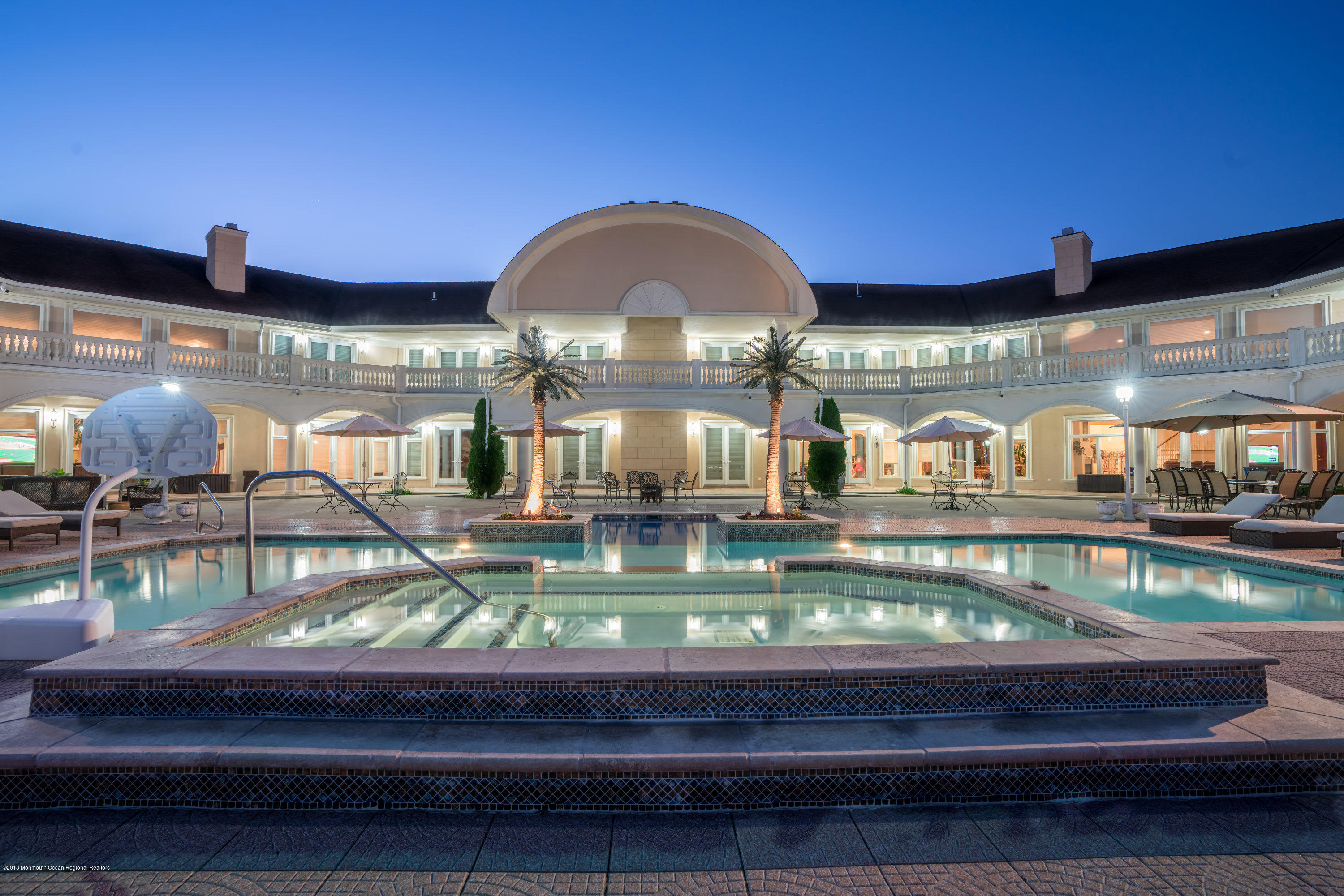 93 Five Points Road Freehold, NJ 07728 - Photo 46 of 48 a kitchen with a stove and a table