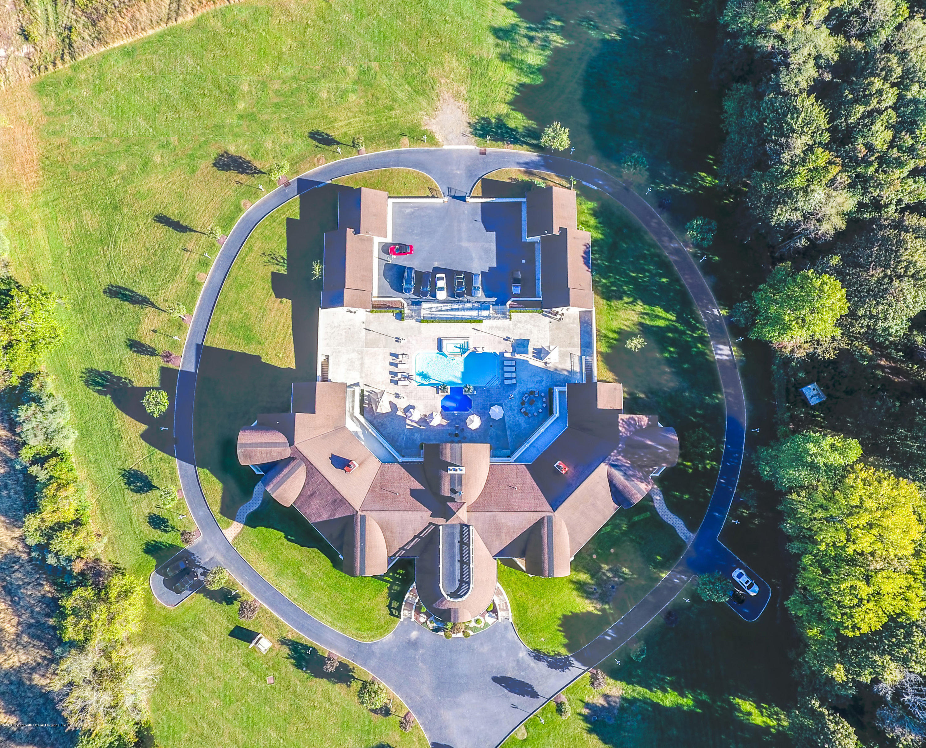 93 Five Points Road Freehold, NJ 07728 - Photo 47 of 48 an aerial view of a house with swimming pool a yard and outdoor seating