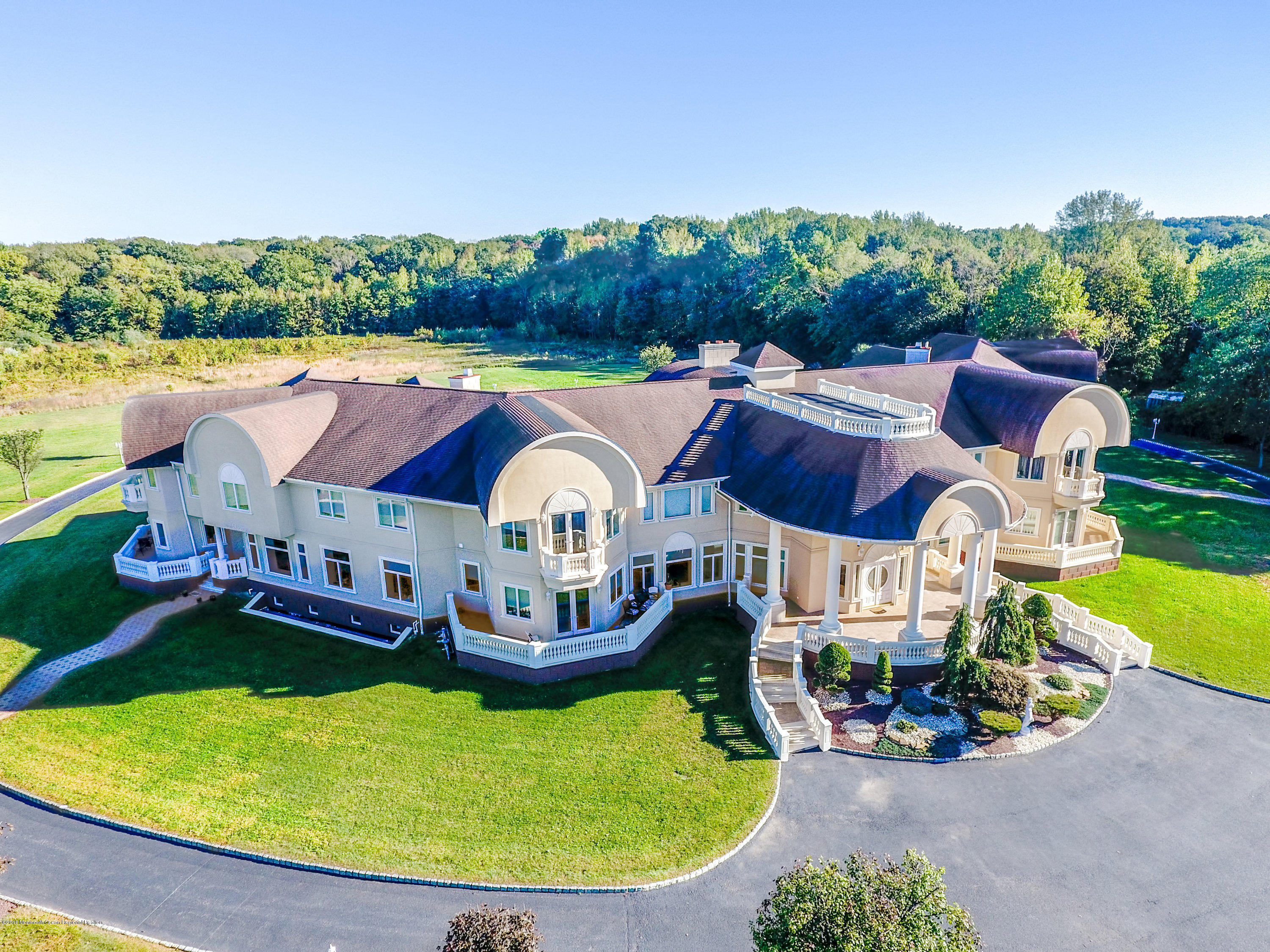 93 Five Points Road Freehold, NJ 07728 - Photo 7 of 48 an aerial view of a house with swimming pool garden and patio