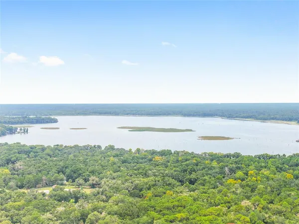 a view of a lake from a yard