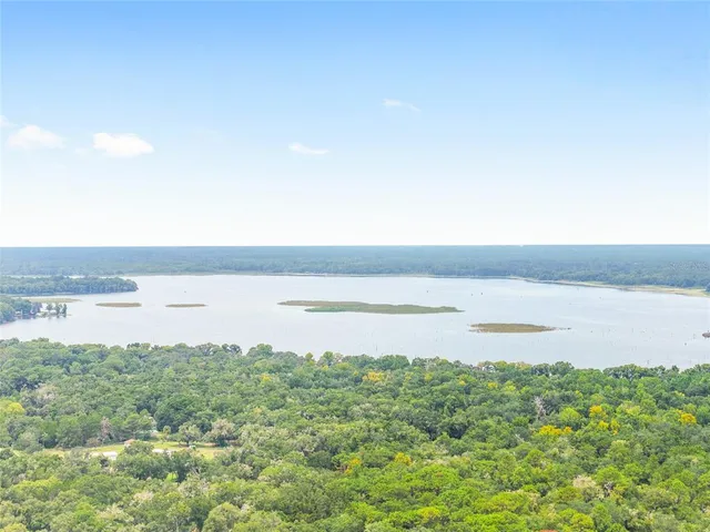 a view of a lake from a yard