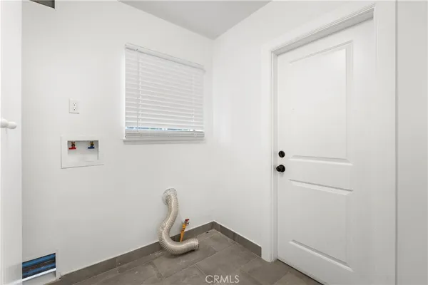 a view of a room with an empty space