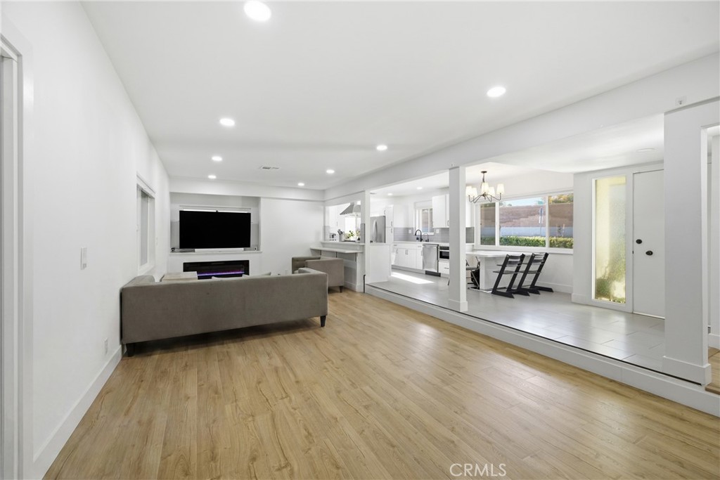 384 Colorado Street Arcadia, CA 91007 - Photo 27 of 51 a living room with furniture and a flat screen tv