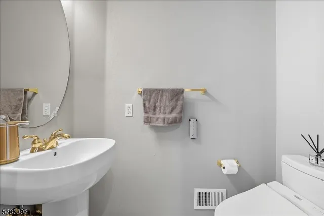 a bathroom with a sink and a toilet