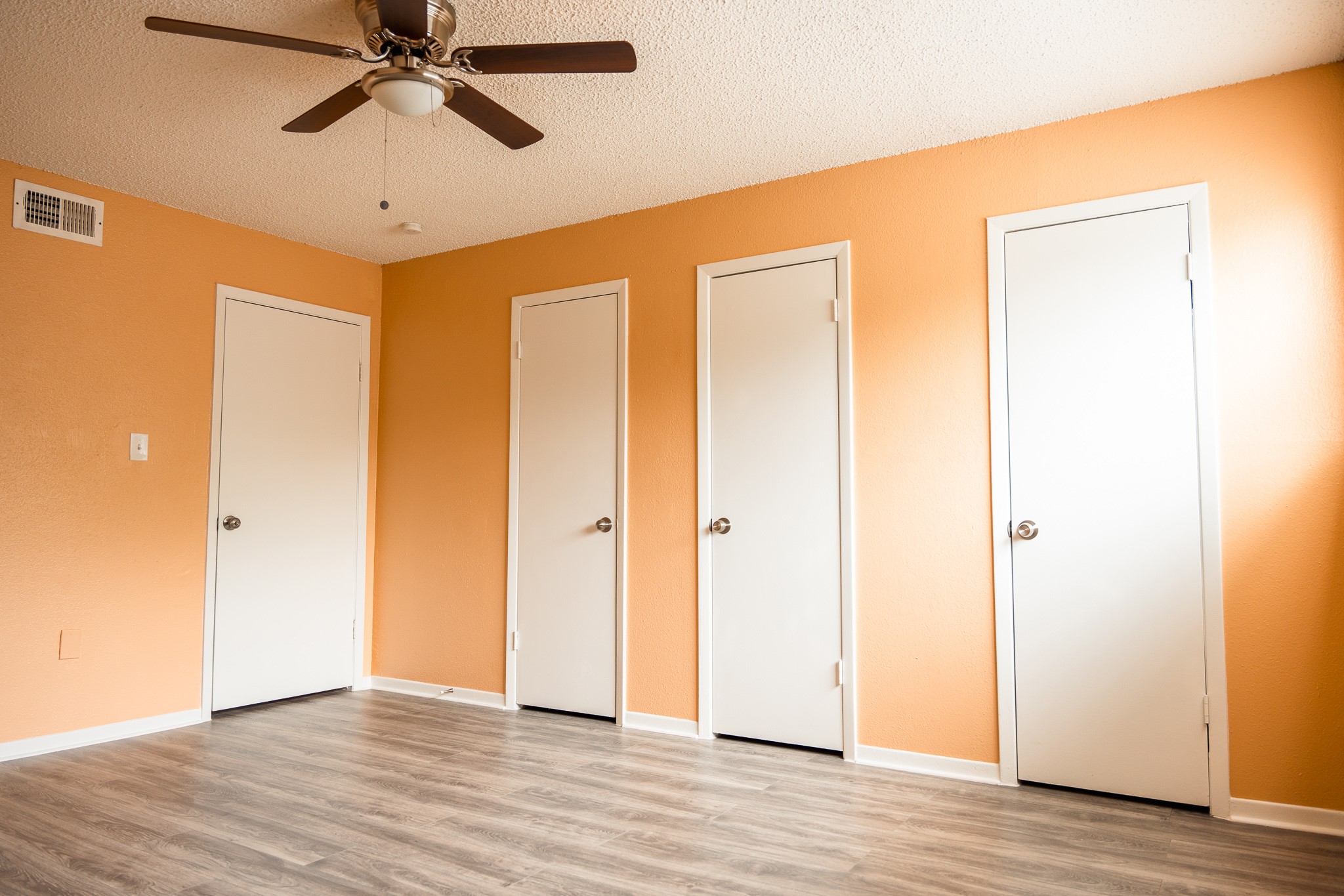 1506 Eagle Lake Road Sealy, TX 77474 - Photo 9 of 17 a view of an empty room and wooden floor