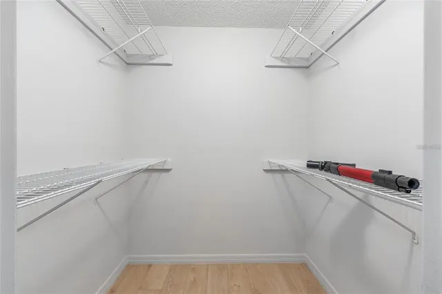 a view of a room with racks on the wall