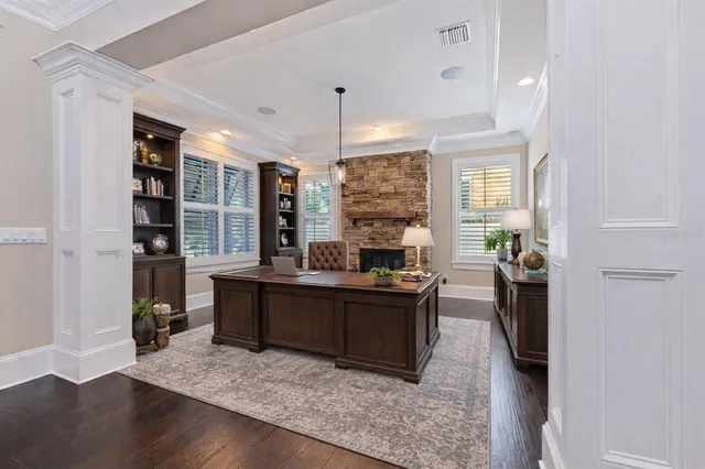 a view of a two chairs in the balcony