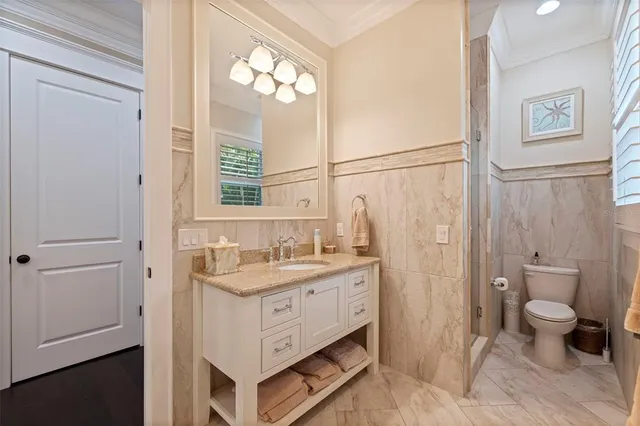 a living room with furniture window and flat screen tv