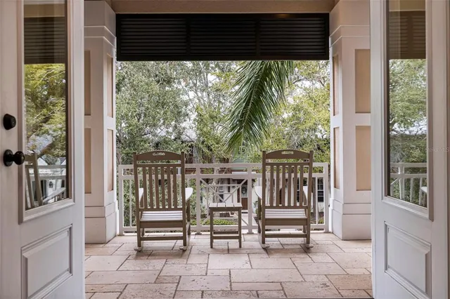 a spacious bathroom with a granite countertop tub sink and mirror