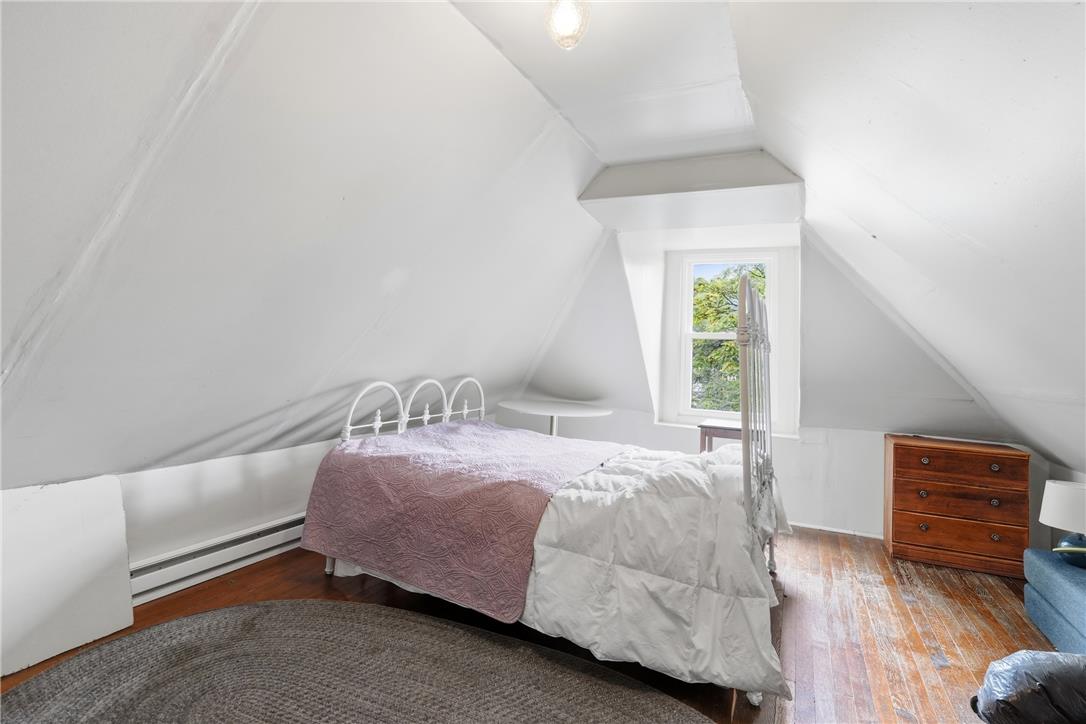 809 Hayes Street Bethlehem, PA 18015 - Photo 23 of 31 Sloped ceilings and original hardwood floors define this charming top-floor space.