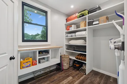 a room with furniture and a window