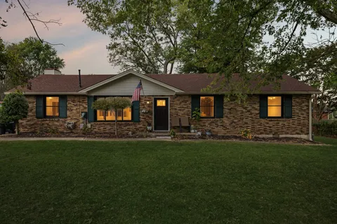 a black and white photo of a living room