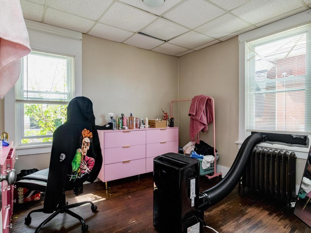 282 9th Street Ambridge, PA 15003 - Photo 14 of 21 a room with furniture and a window
