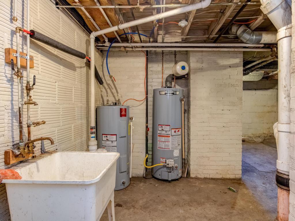 282 9th Street Ambridge, PA 15003 - Photo 20 of 21 a bathroom with a sink and a shower