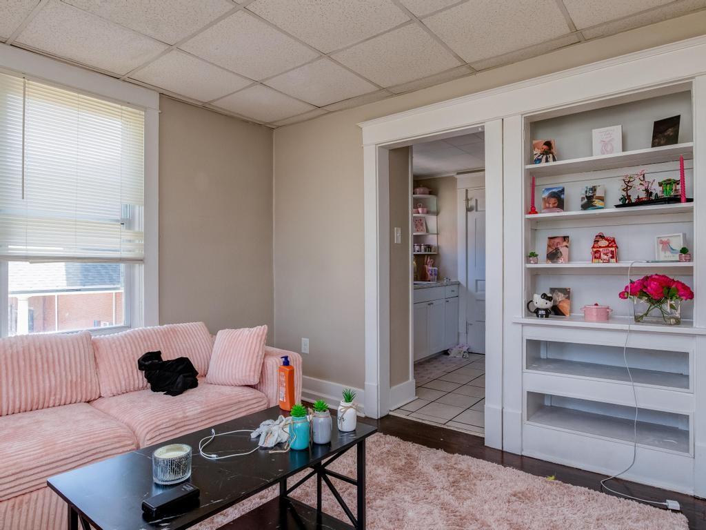 282 9th Street Ambridge, PA 15003 - Photo 7 of 21 a bedroom with a bed and a window