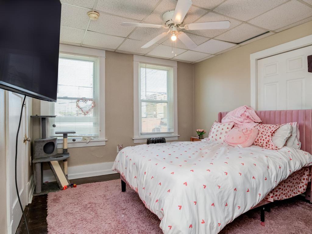 282 9th Street Ambridge, PA 15003 - Photo 10 of 21 a bedroom with a bed and a window