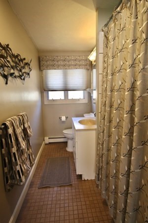 16 Wentworth Road Canton, MA 02021 - Photo 12 of 26 a bathroom with a sink and a toilet