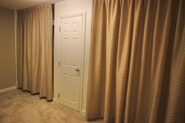 16 Wentworth Road Canton, MA 02021 - Photo 17 of 26 a view of a bathroom with a shower curtain