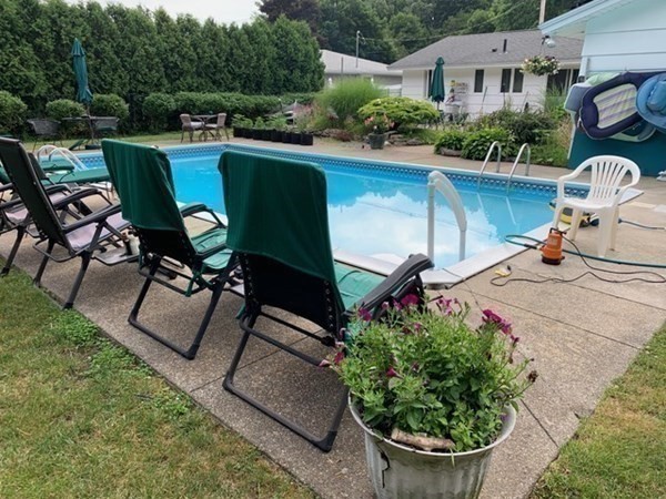 16 Wentworth Road Canton, MA 02021 - Photo 21 of 26 a view of a chairs and table in backyard