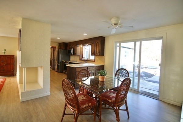 16 Wentworth Road Canton, MA 02021 - Photo 5 of 26 a view of a dining room with furniture and wooden floor