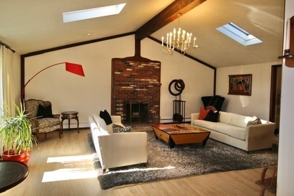16 Wentworth Road Canton, MA 02021 - Photo 6 of 26 a living room with fireplace furniture and a large window