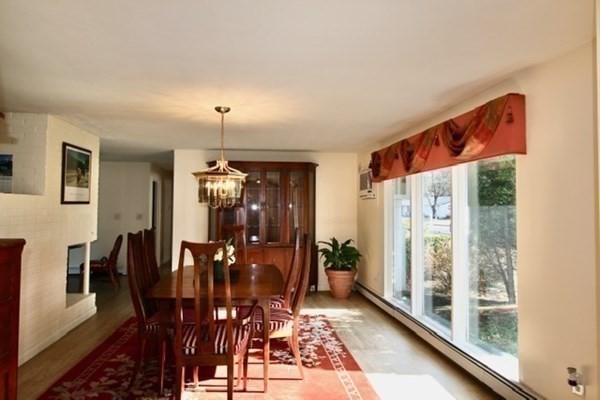16 Wentworth Road Canton, MA 02021 - Photo 10 of 26 a view of a dining room with furniture window and wooden floor