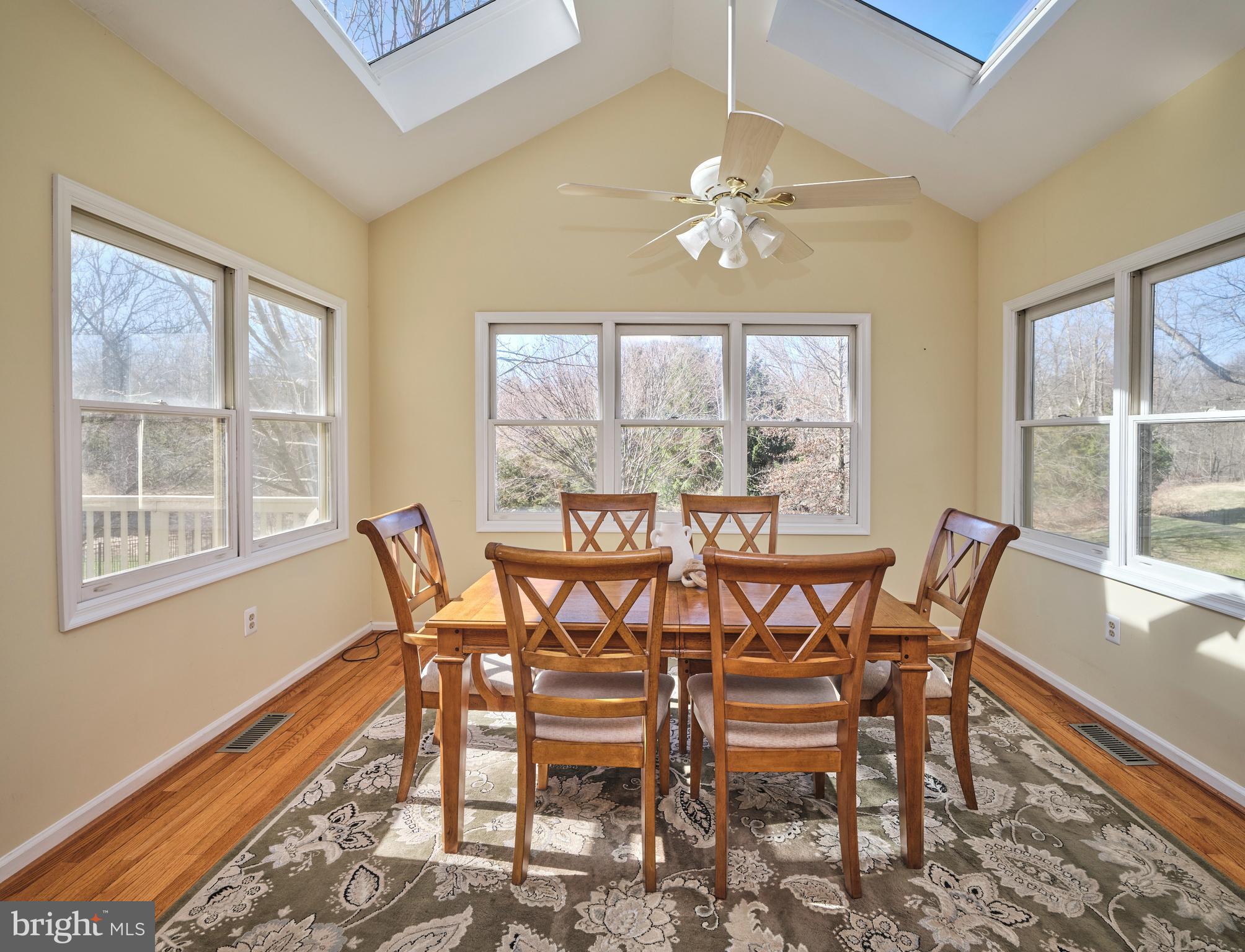 38 Bittersweet Drive Doylestown, PA 18901 - Photo 12 of 36 a view of a dining room with furniture wooden floor and chandelier