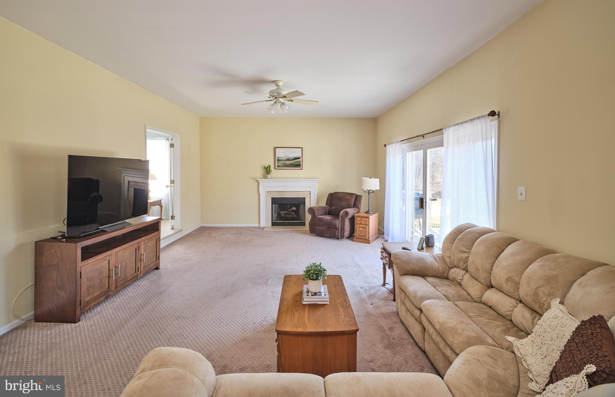 38 Bittersweet Drive Doylestown, PA 18901 - Photo 14 of 36 a living room with furniture and a flat screen tv