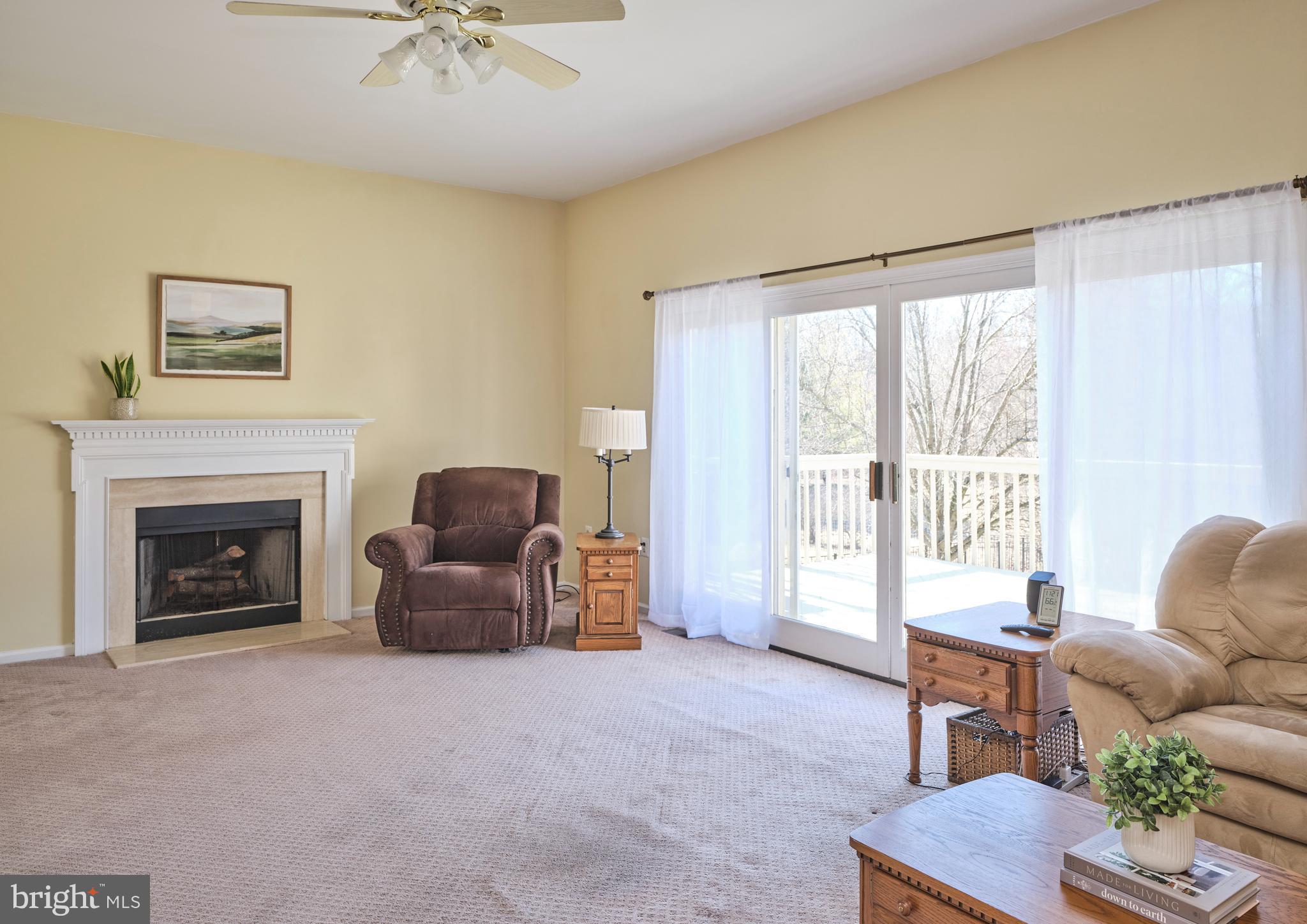 38 Bittersweet Drive Doylestown, PA 18901 - Photo 15 of 36 a living room with furniture and a fireplace