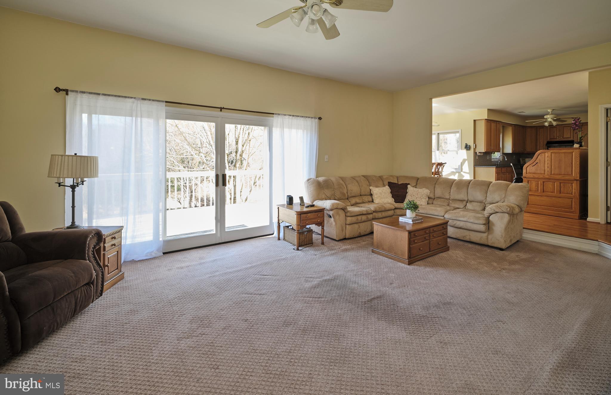38 Bittersweet Drive Doylestown, PA 18901 - Photo 16 of 36 a living room with furniture and a large window