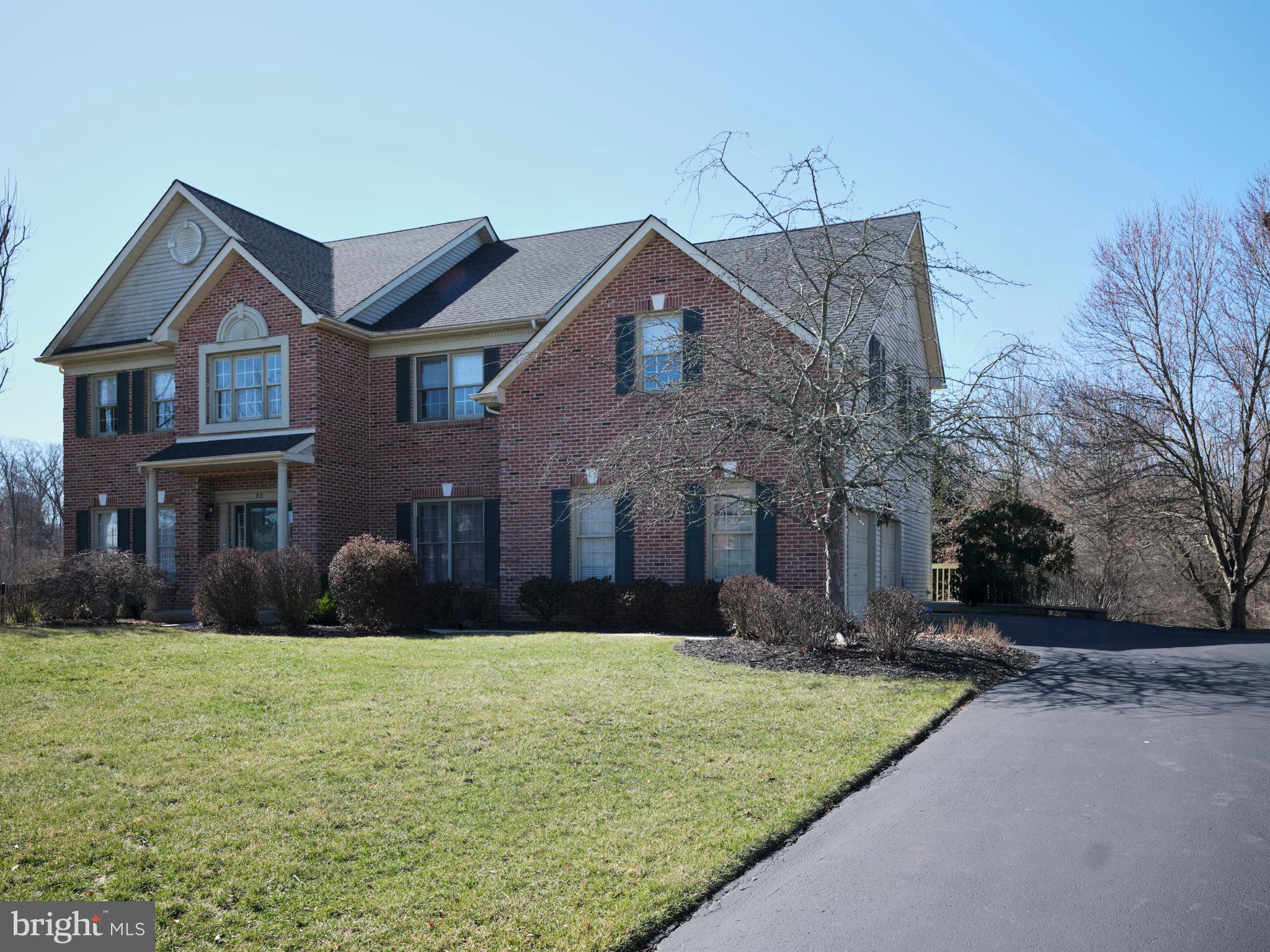 38 Bittersweet Drive Doylestown, PA 18901 - Photo 2 of 36 a front view of house with yard and trees