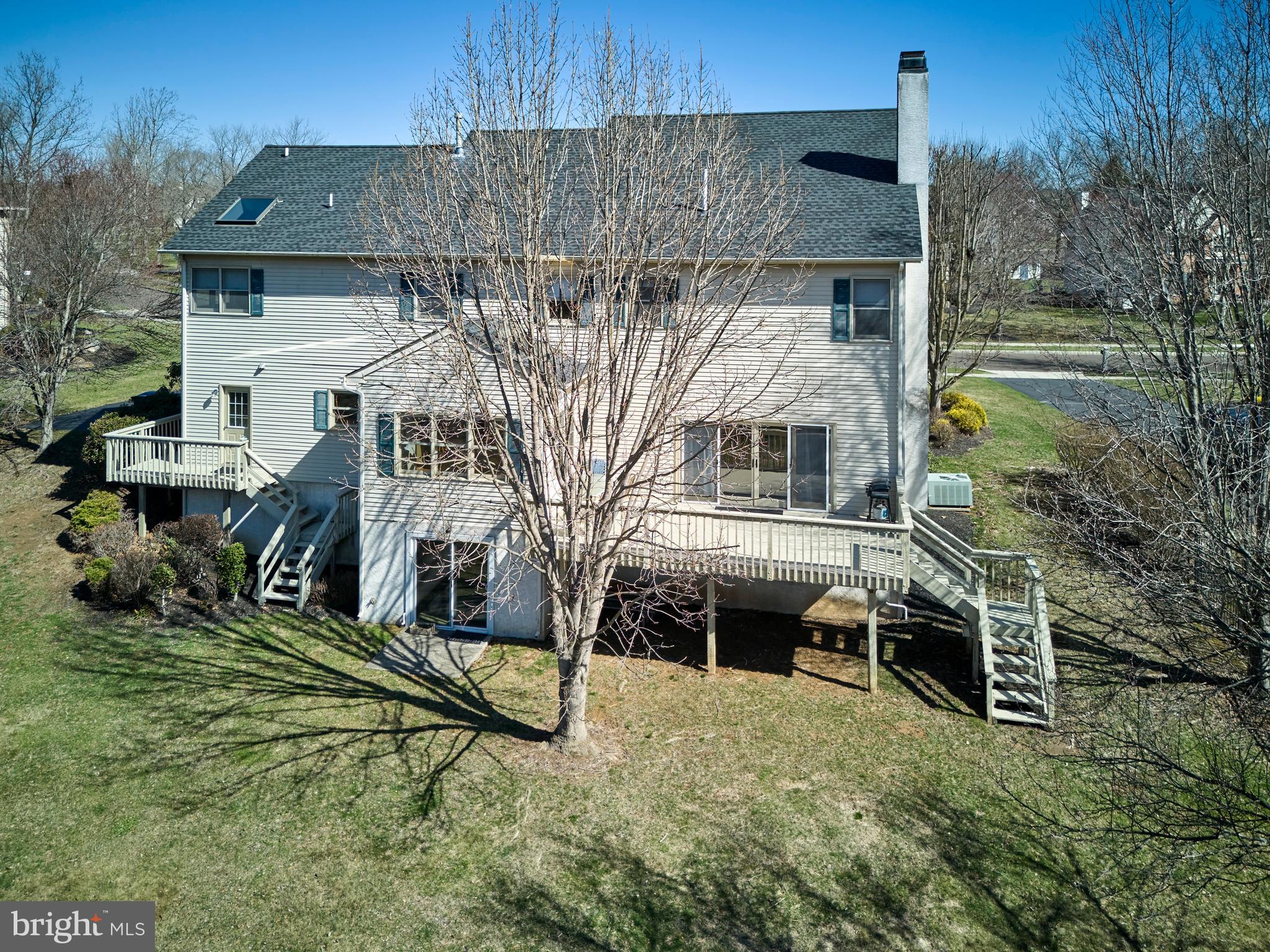 38 Bittersweet Drive Doylestown, PA 18901 - Photo 33 of 36 a view of a house with backyard and sitting area