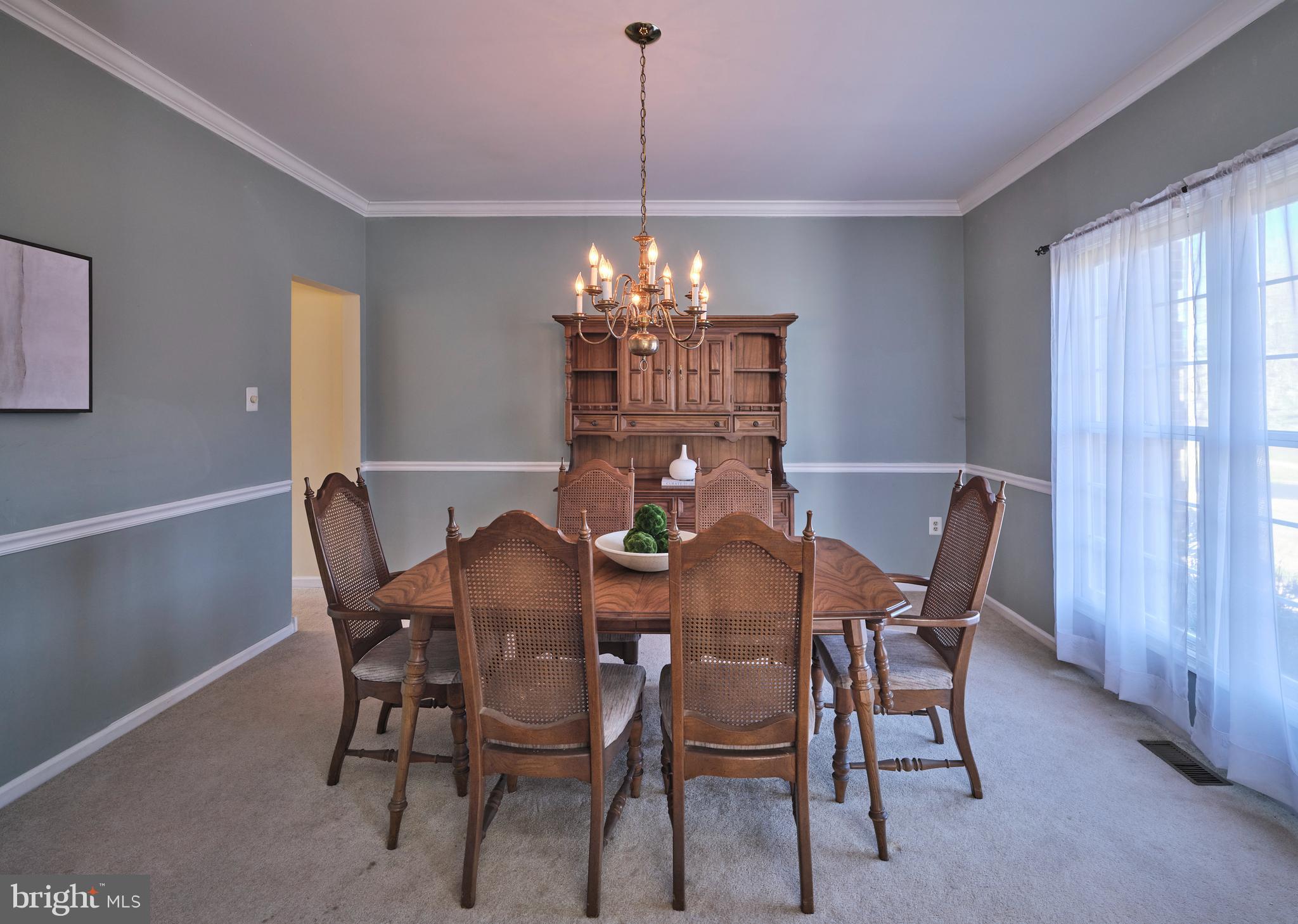 38 Bittersweet Drive Doylestown, PA 18901 - Photo 7 of 36 a view of a dining room with furniture and chandelier