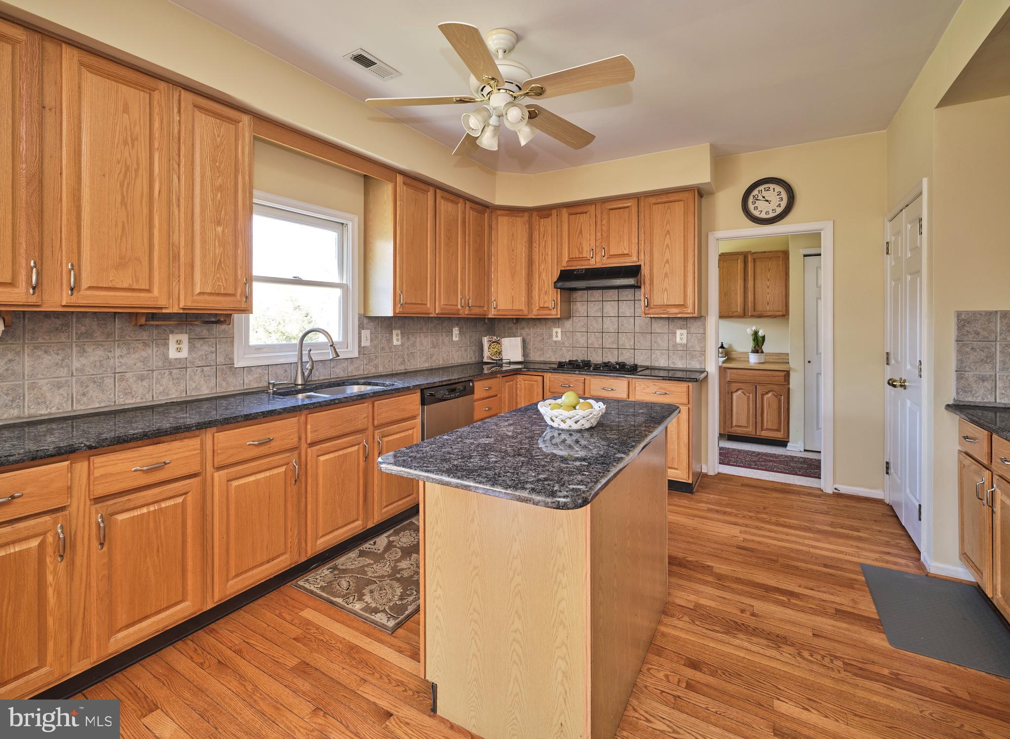38 Bittersweet Drive Doylestown, PA 18901 - Photo 9 of 36 a kitchen with stainless steel appliances granite countertop a sink stove and refrigerator