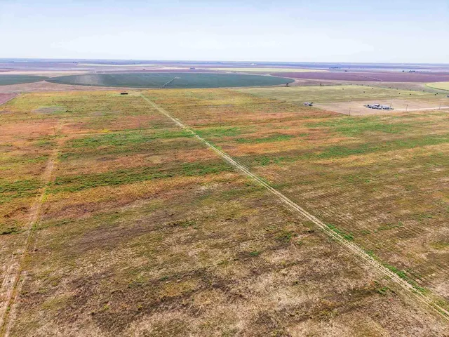 a view of an ocean and a mountain