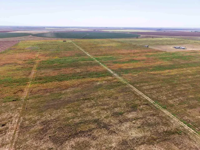 a view of an ocean and a mountain