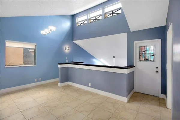 a view of a hallway with entryway